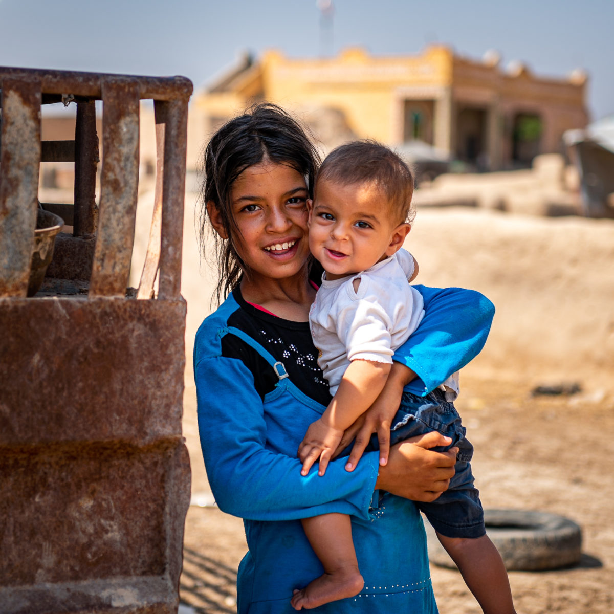 Amal, taking care of her little sister, as her parents depend on her in helping around the house ; After nine years into the Syrian crisis, more than 11.7 million people have been displaced all over the country, many have lost all their belongings and fled with the clothes on their back. People slept on the floor and children walked barefoot, and most didn’t even have the basic items to cover their daily needs. UNHCR steps in with its mission to protect the victims and support them with food, blankets, cooking utensils and many other small items that help them survive their harrowing ordeals until the day they can, hopefully, return home.